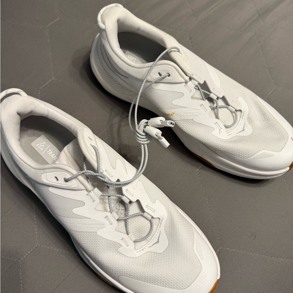 Hoka One One White Athletic Shoes Sleek Design Cushioned Sole transport men’s
